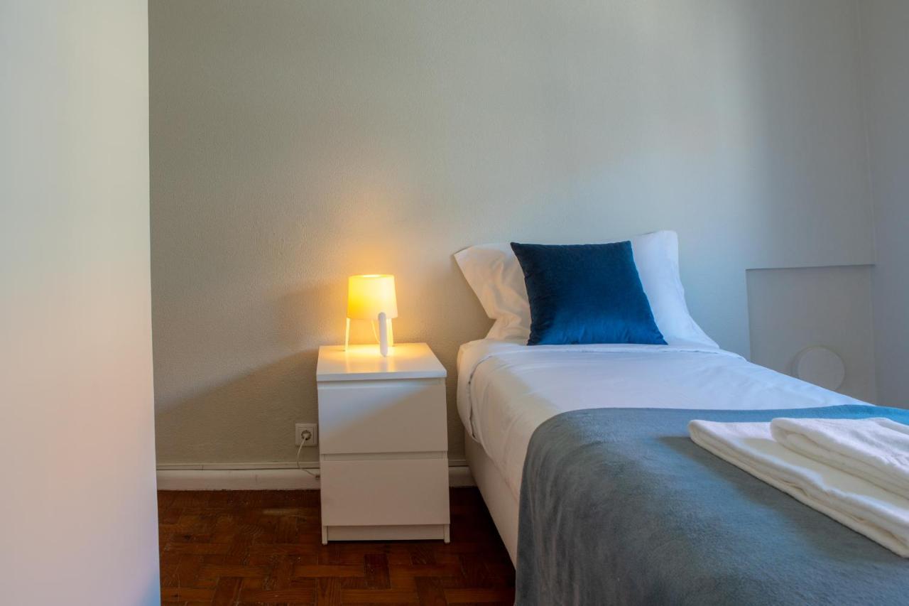 Quarto Individual com Banheiro Compartilhado